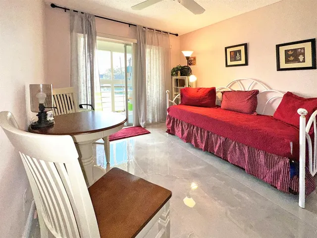 a living room with a couch and a table