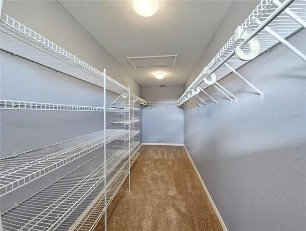 a view of a room with racks on the wall
