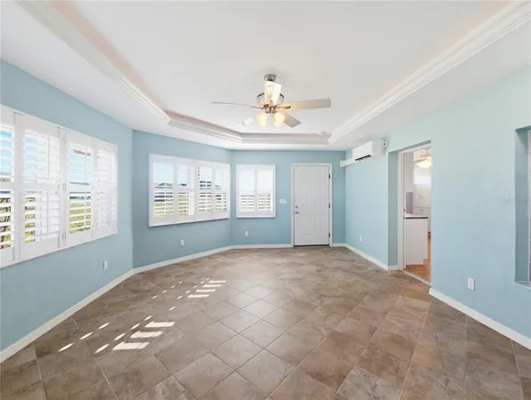 a view of an empty room with a window