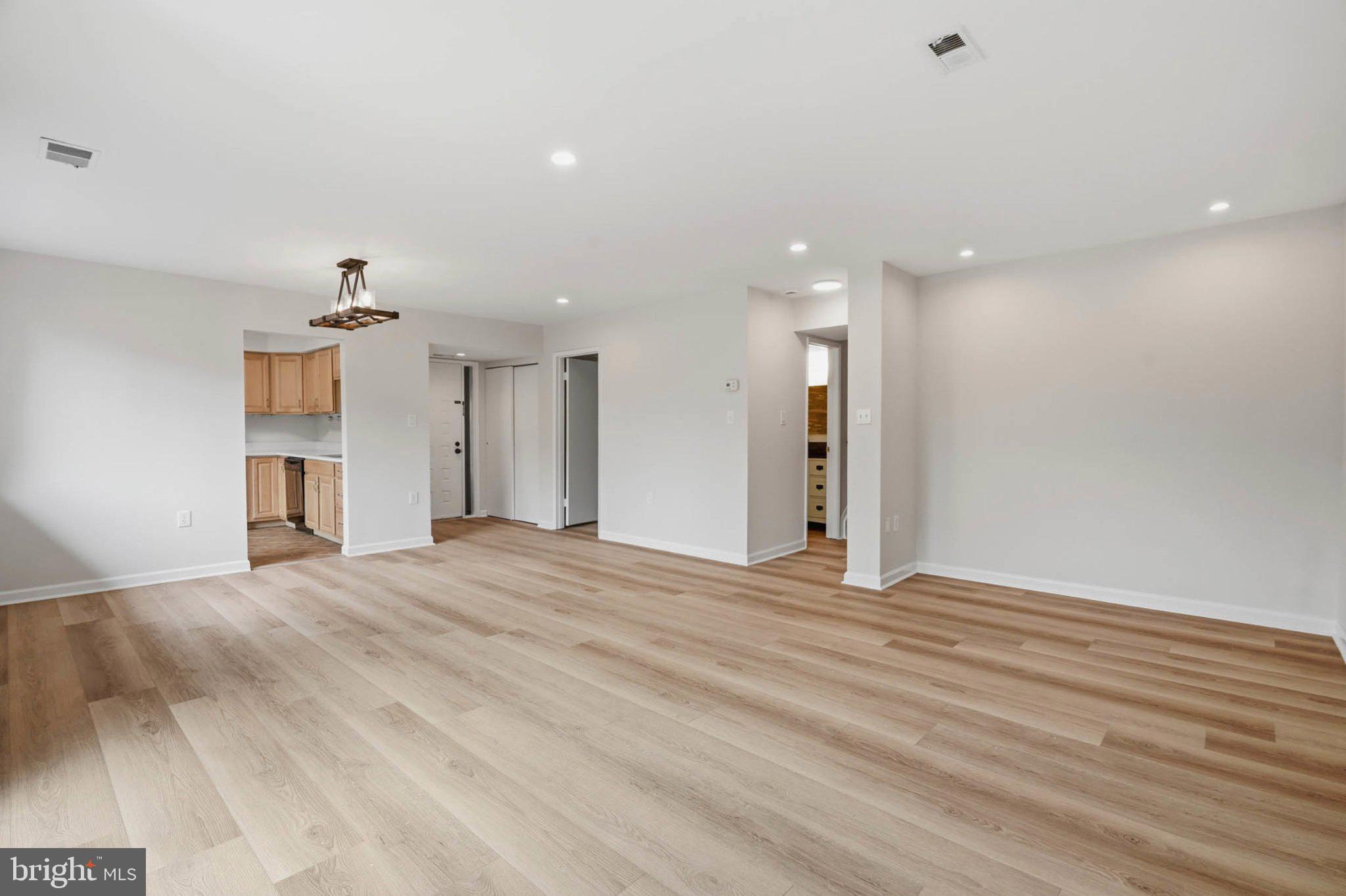 10901 Trotting Ridge Way, Unit 92 Columbia, MD 21044 - Photo 13 of 37 Spacious, light-filled living area.