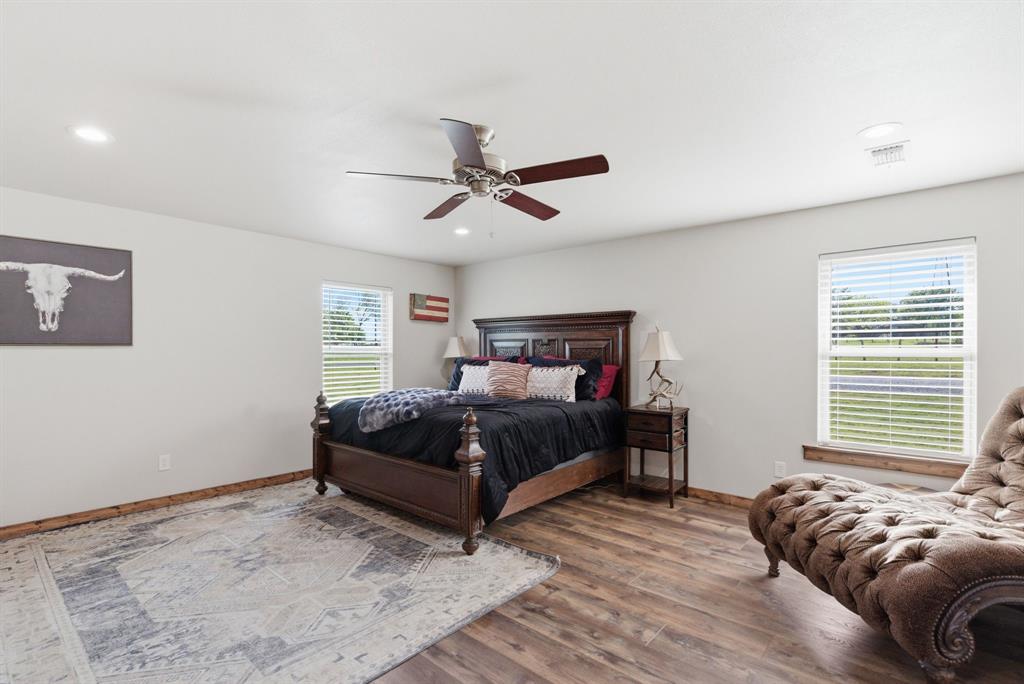 187 County Road 4195 Decatur, TX 76234 - Photo 17 of 40 a bedroom with a bed and window