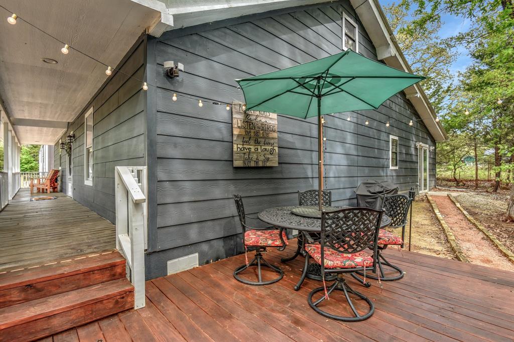 2199 Hawkins Road Whitesboro, TX 76273 - Photo 31 of 33 Wooden deck with outdoor dining area