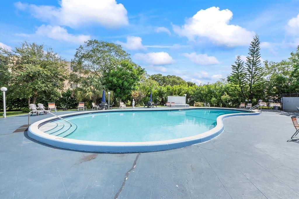 2840 Somerset Drive, Unit 205M Lauderdale Lakes, FL 33311 - Photo 21 of 22 a view of outdoor space and yard