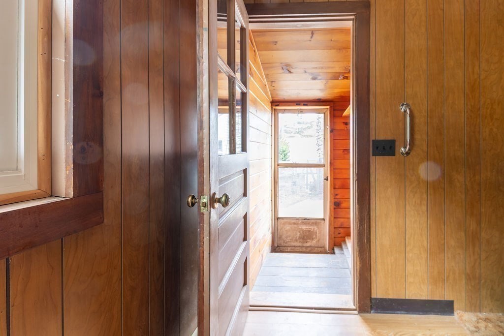 80 Lakeview Road Shutesbury, MA 01072 - Photo 15 of 34 a view of a glass door and a window
