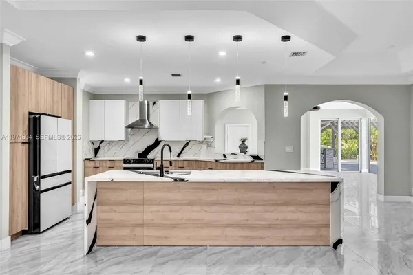 $1,840,000 | 12555 Southwest 34th Place, Davie, FL 33330