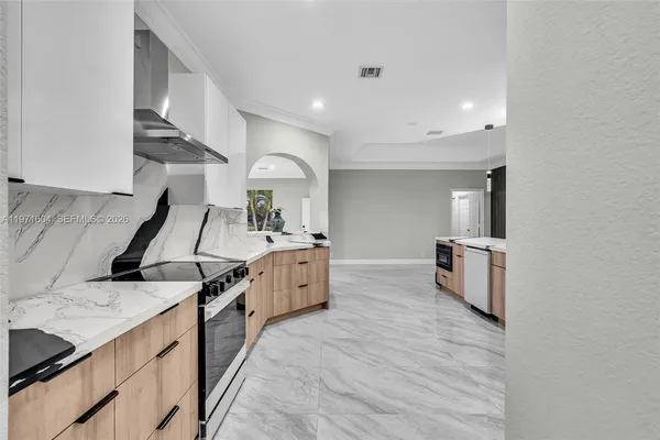 $1,840,000 | 12555 Southwest 34th Place, Davie, FL 33330