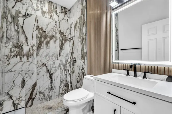 $1,840,000 | 12555 Southwest 34th Place, Davie, FL 33330