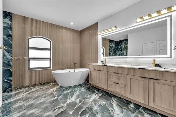 $1,840,000 | 12555 Southwest 34th Place, Davie, FL 33330