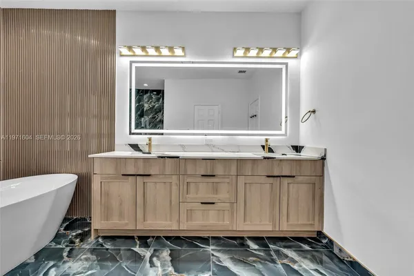 $1,840,000 | 12555 Southwest 34th Place, Davie, FL 33330