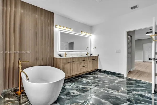 $1,840,000 | 12555 Southwest 34th Place, Davie, FL 33330