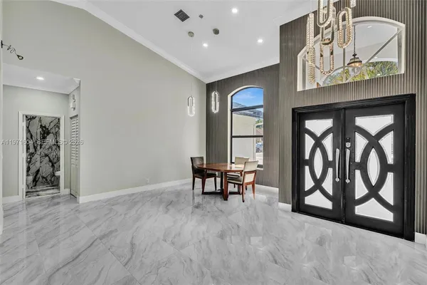 $1,840,000 | 12555 Southwest 34th Place, Davie, FL 33330