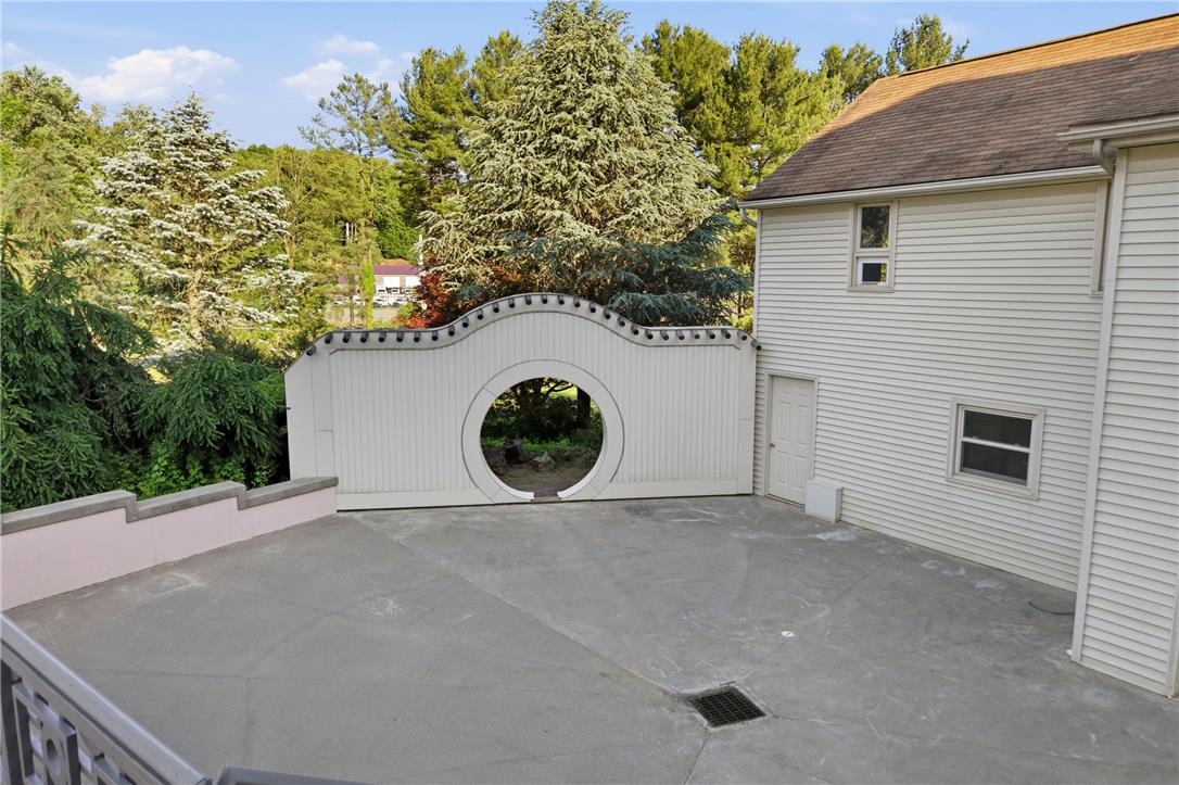 6271 Batman Road Zionsville, PA 18092 - Photo 89 of 100 An inviting courtyard with an ornamental gate offers private outdoor space.