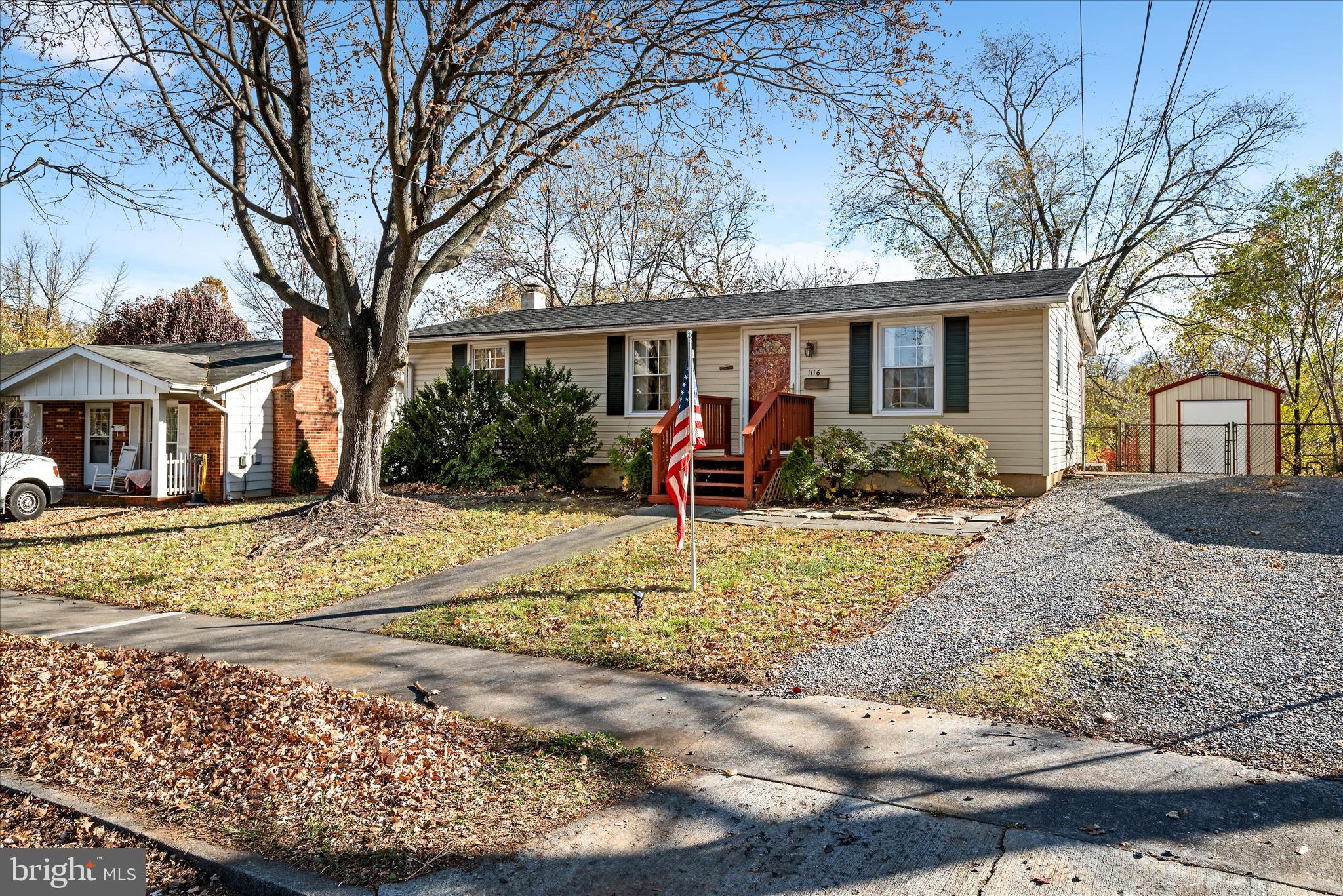 1116 Opequon Avenue Winchester, VA 22601 - Photo 1 of 30 a front view of a house with garden