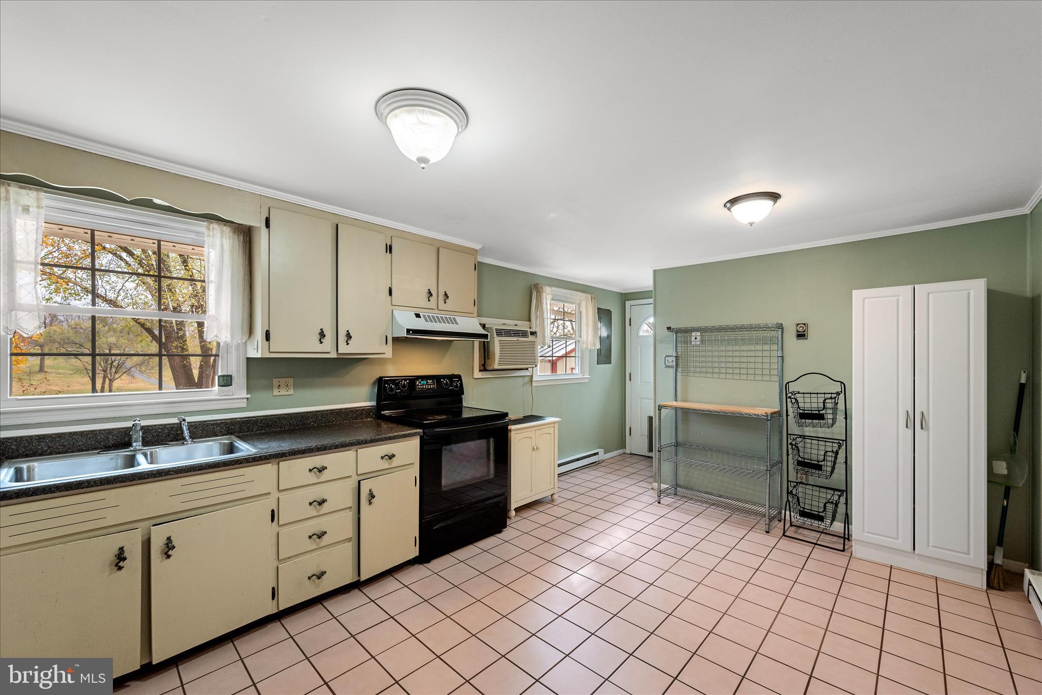 1116 Opequon Avenue Winchester, VA 22601 - Photo 11 of 30 a kitchen with stainless steel appliances a refrigerator sink and cabinets