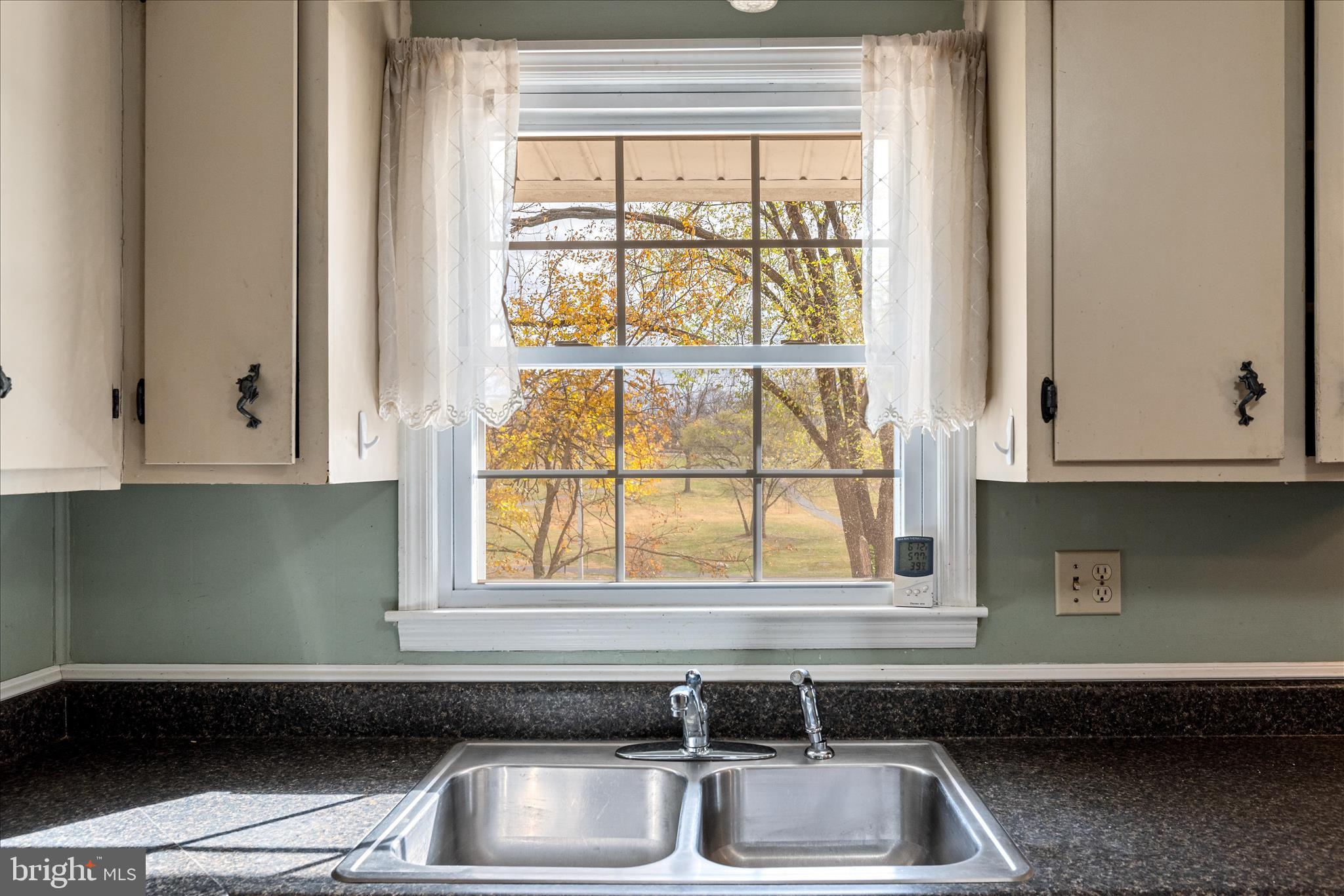1116 Opequon Avenue Winchester, VA 22601 - Photo 12 of 30 a kitchen with a sink and a window