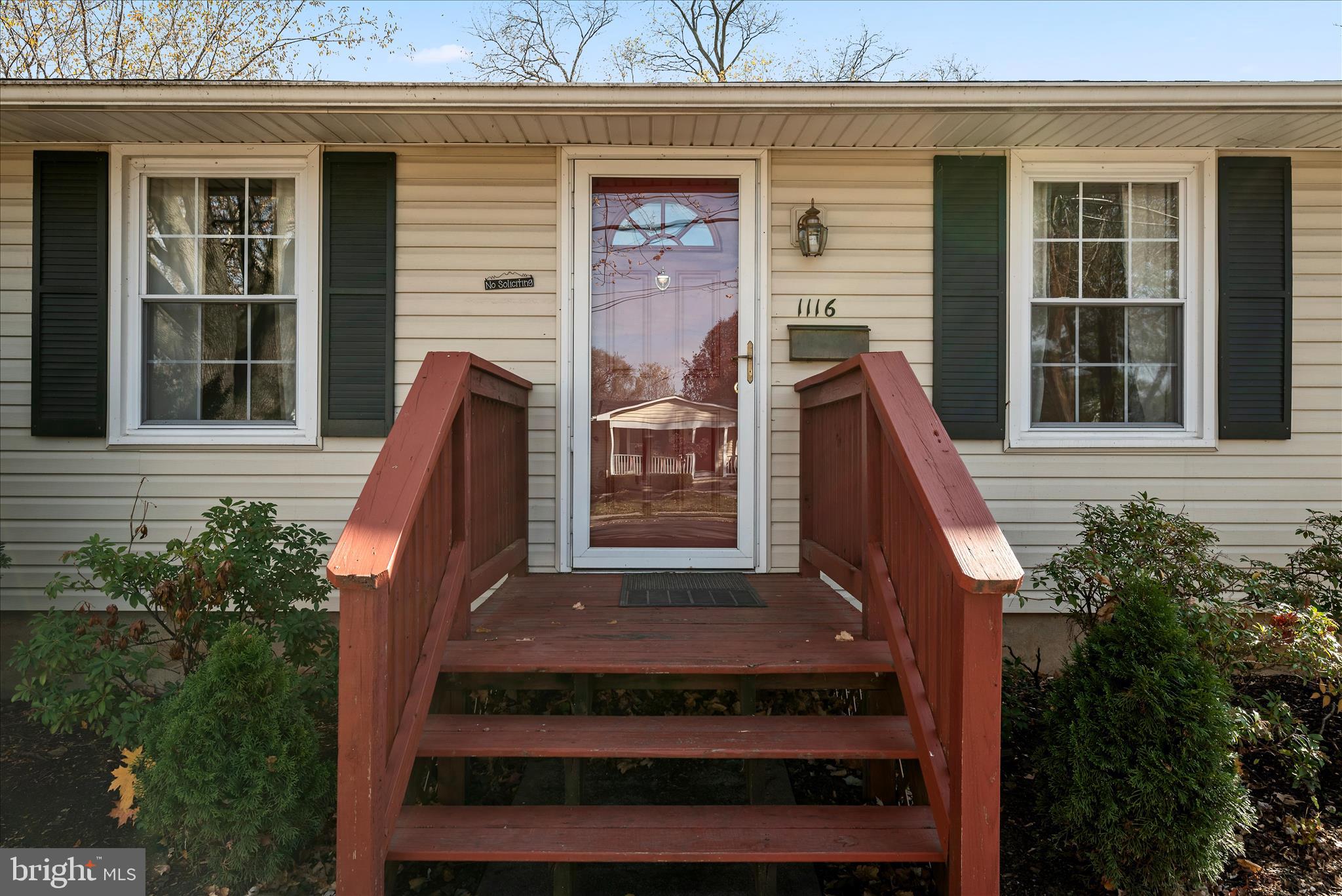 1116 Opequon Avenue Winchester, VA 22601 - Photo 3 of 30 a front view of a house with a garden