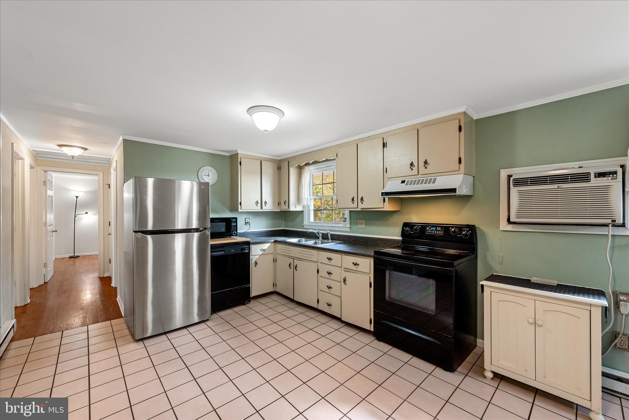 1116 Opequon Avenue Winchester, VA 22601 - Photo 8 of 30 a kitchen with stainless steel appliances granite countertop a refrigerator sink and stove