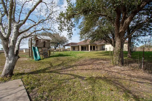 a view of a yard in front of house