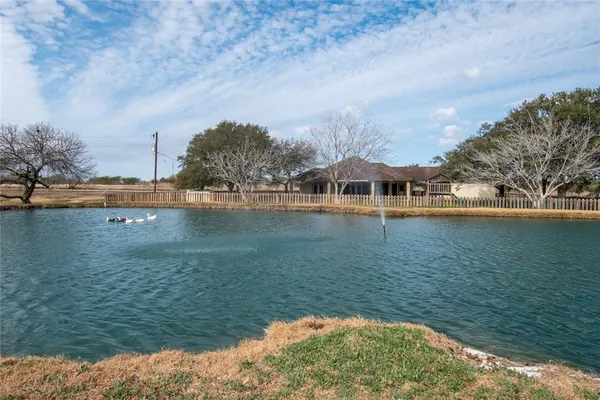a view of a lake with houses