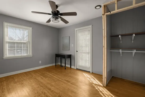 a view of room with workspace and a window