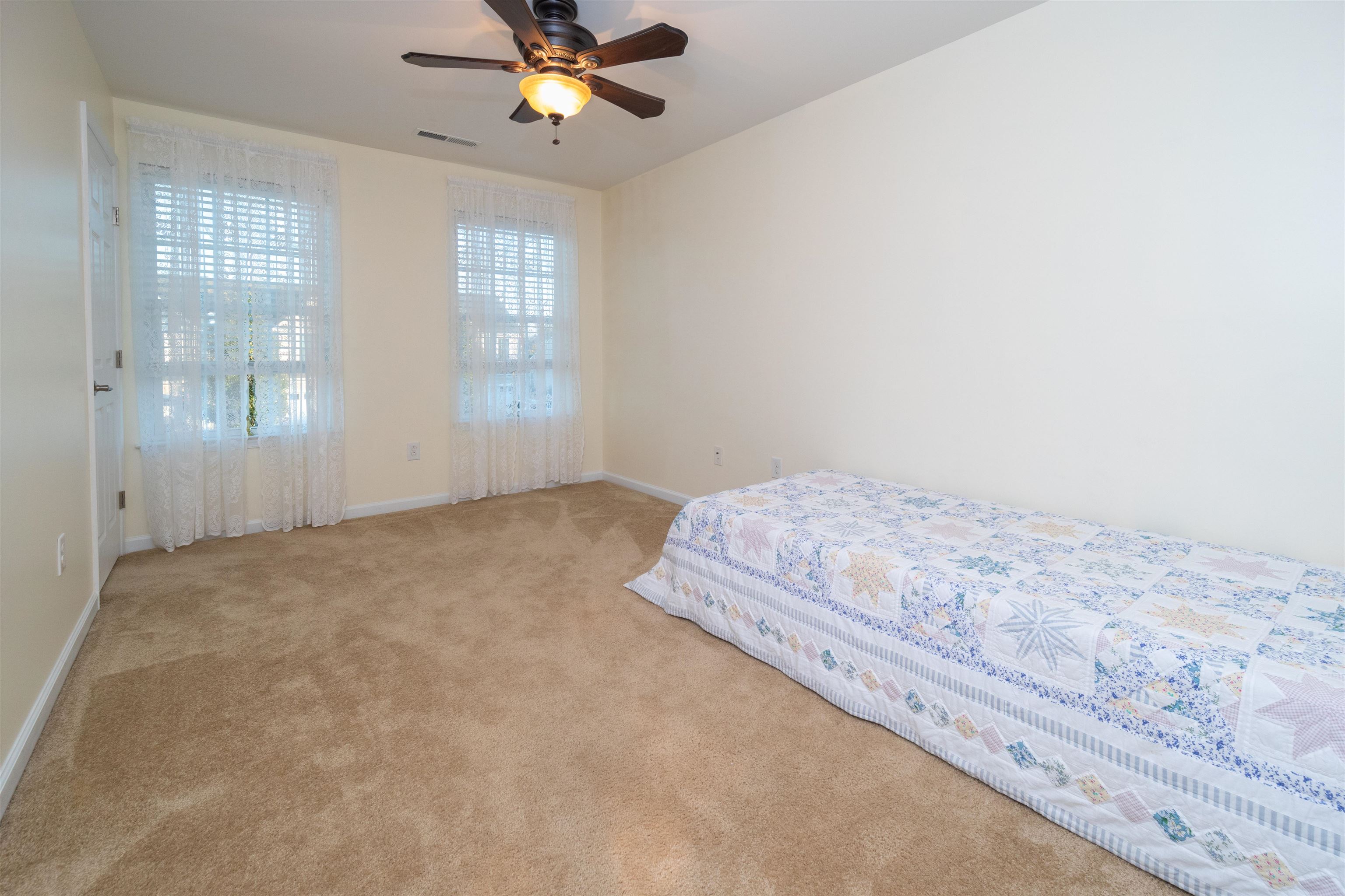 206 Seacrest Lane, Unit 155 Rio Grande, NJ 08242 - Photo 34 of 50 a bedroom with a bed and window