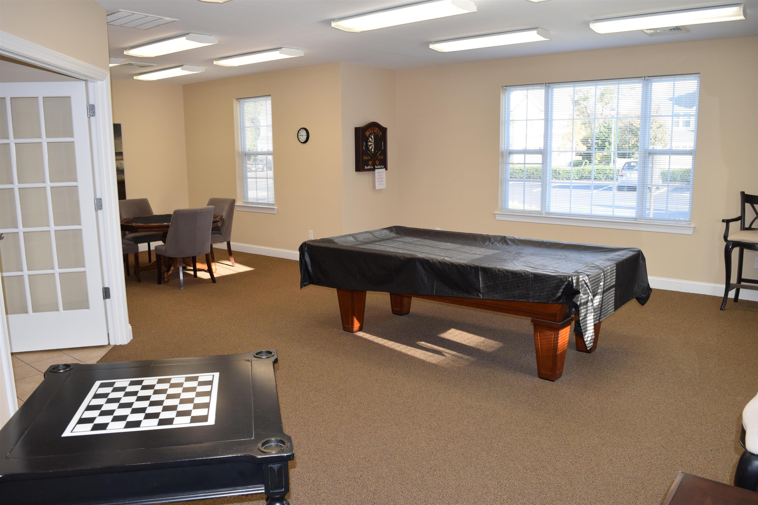 206 Seacrest Lane, Unit 155 Rio Grande, NJ 08242 - Photo 45 of 50 a living room with furniture and a window