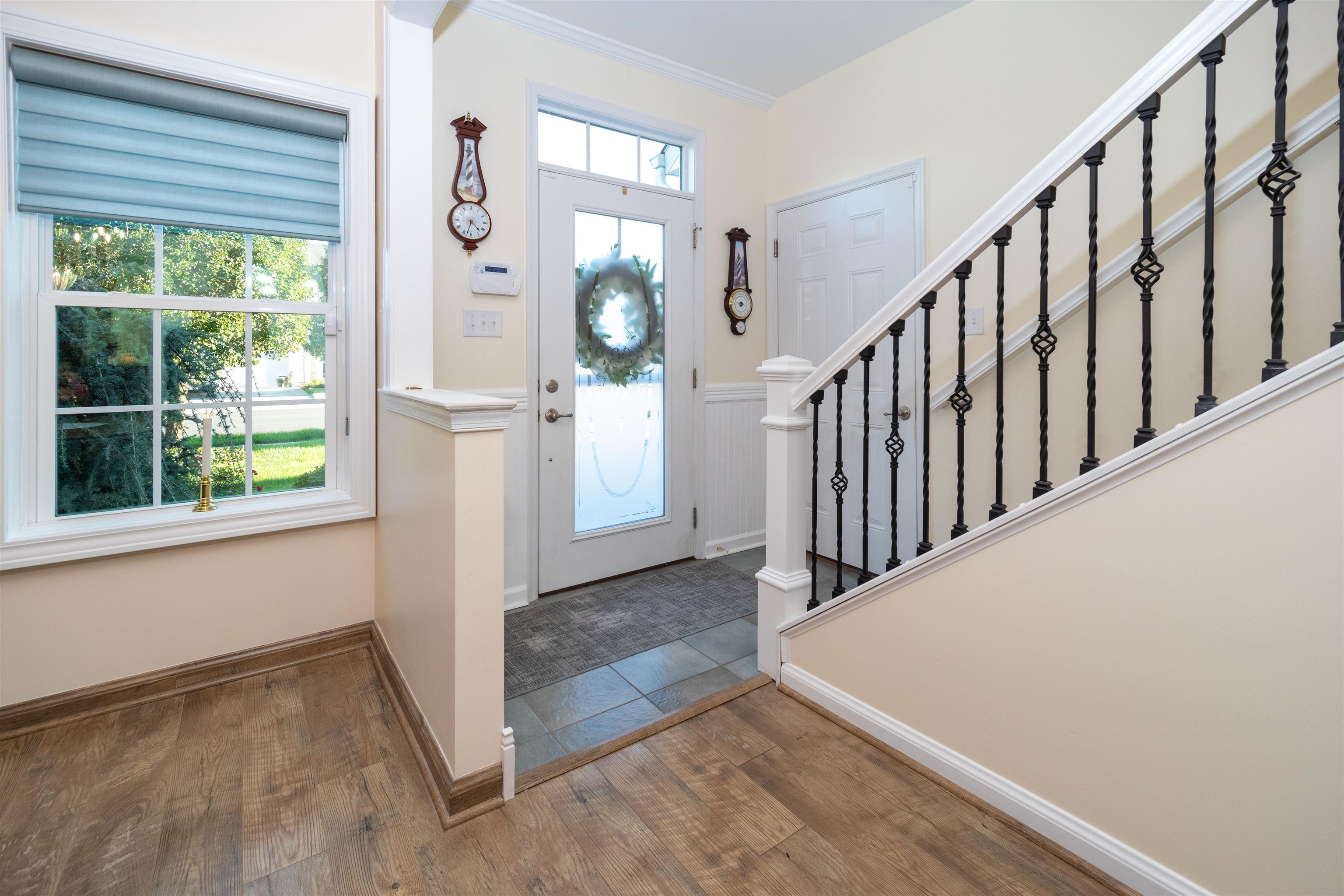 206 Seacrest Lane, Unit 155 Rio Grande, NJ 08242 - Photo 7 of 50 a view of a hallway with wooden floor and staircase