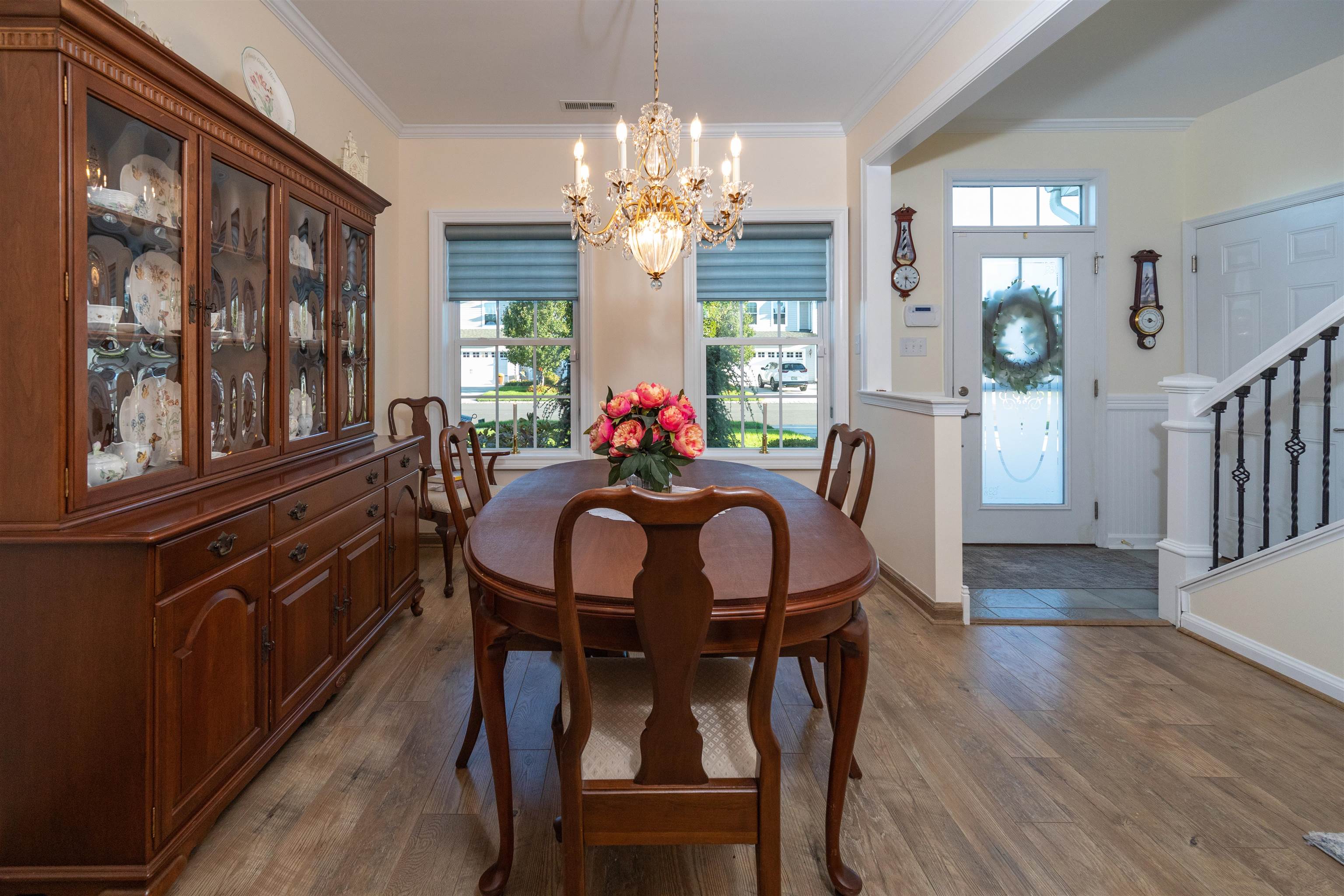 206 Seacrest Lane, Unit 155 Rio Grande, NJ 08242 - Photo 8 of 50 a dining room with furniture a chandelier and wooden floor