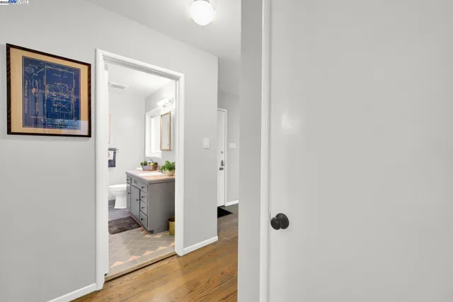 a bathroom with a toilet sink and shower