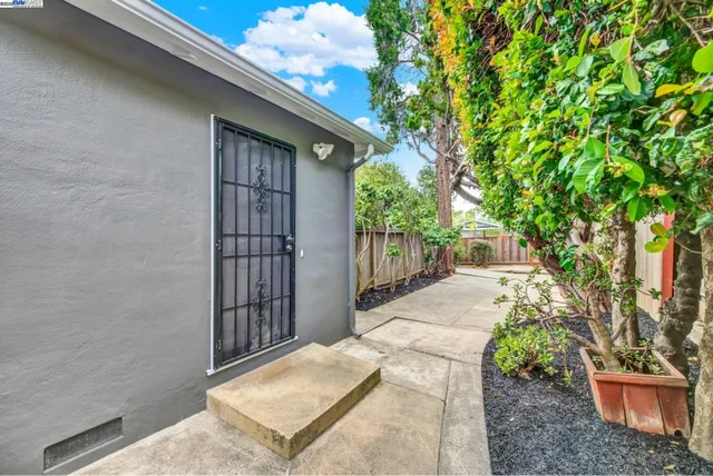 a backyard of a house with lots of green space