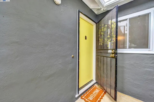 a view of a hallway with a door