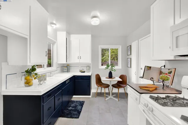 a kitchen with a sink and wooden cabinets
