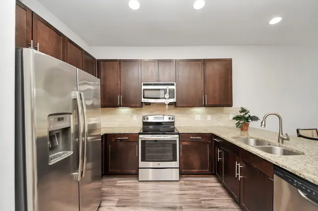 a view of a livingroom with furniture