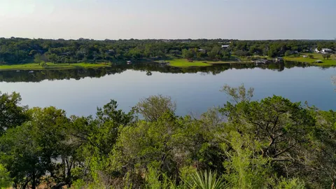 a view of a lake with a city view