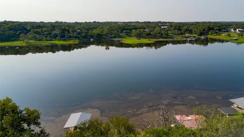 a view of a lake with a city view