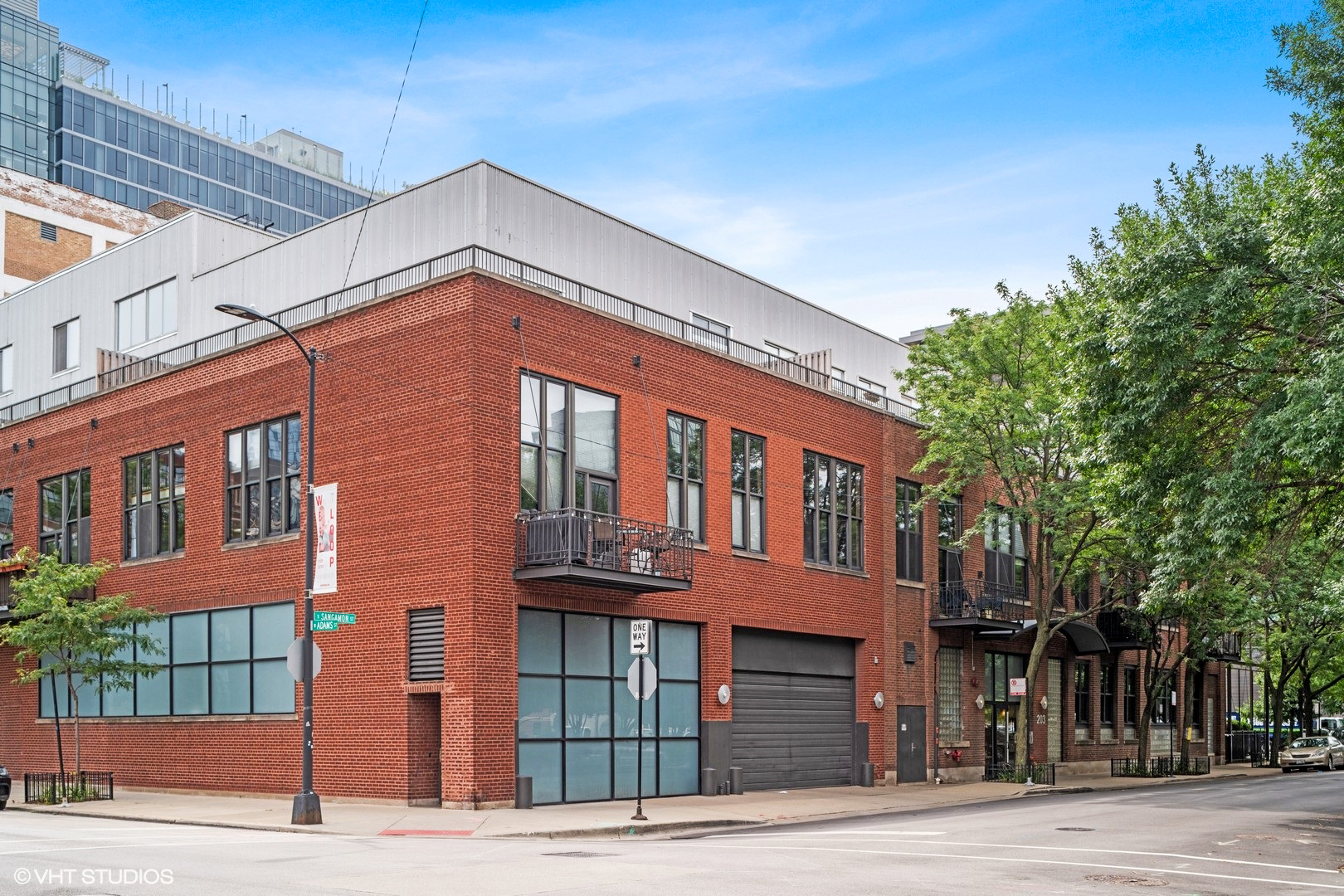 203 South Sangamon Street, Unit 304 Chicago, IL 60607 - Photo 1 of 15 a front view of a building
