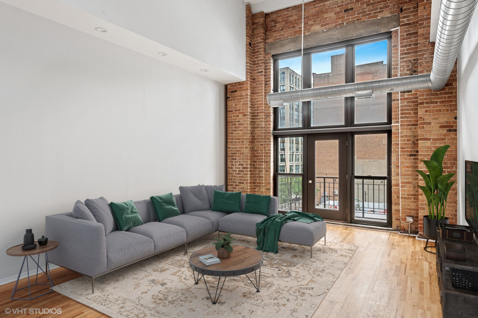 203 South Sangamon Street, Unit 304 Chicago, IL 60607 - Photo 8 of 15 a living room with furniture and a floor to ceiling window