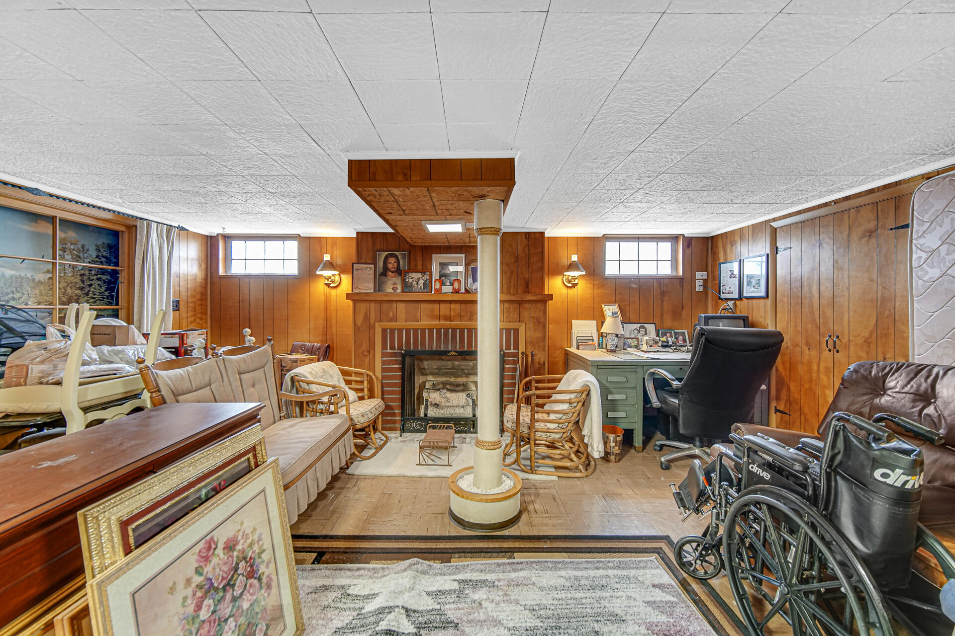 928 176th Street Hammond, IN 46324 - Photo 14 of 25 a living room with fireplace furniture and a wooden floor