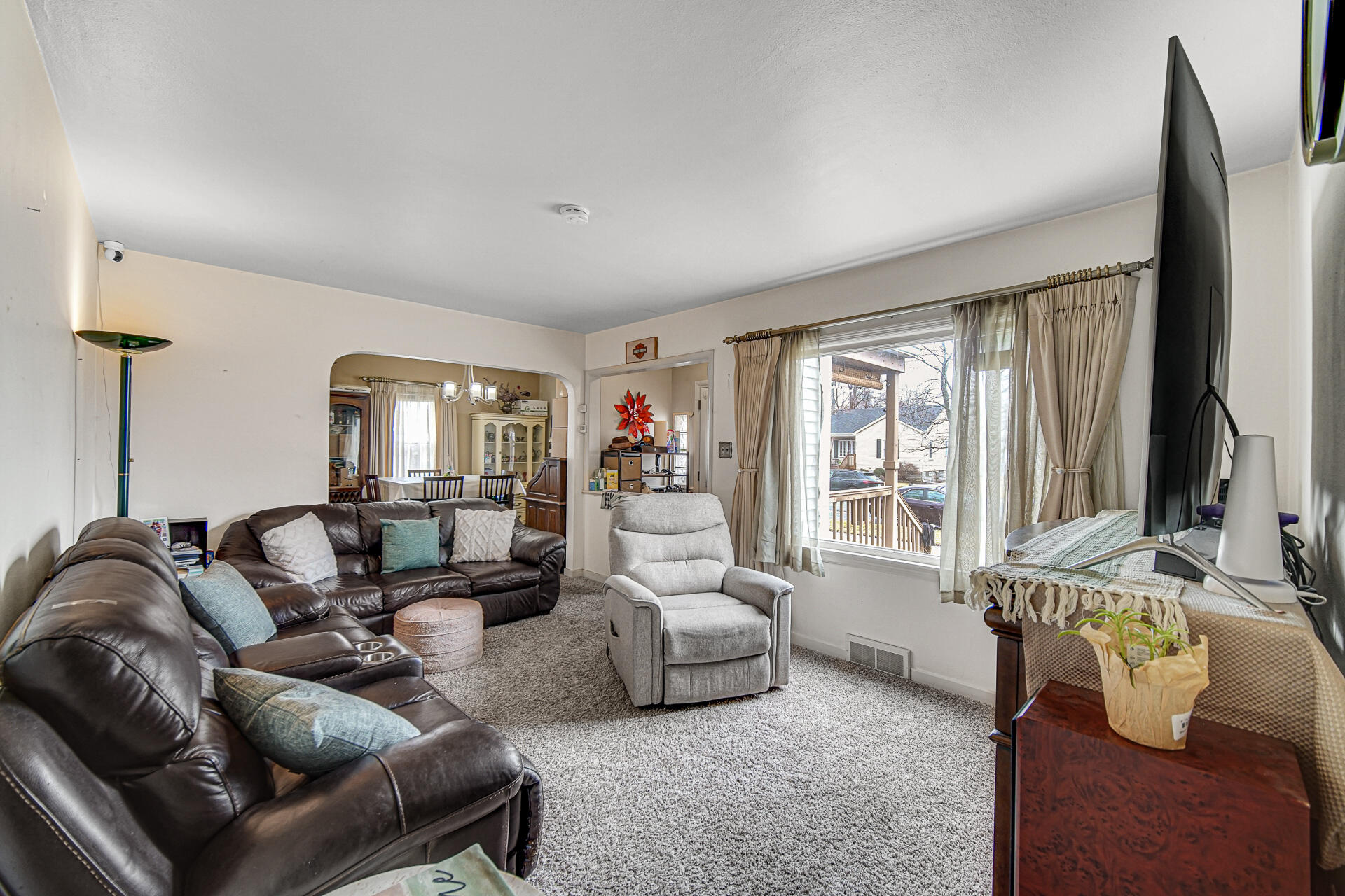 928 176th Street Hammond, IN 46324 - Photo 2 of 25 a living room with furniture and a large window