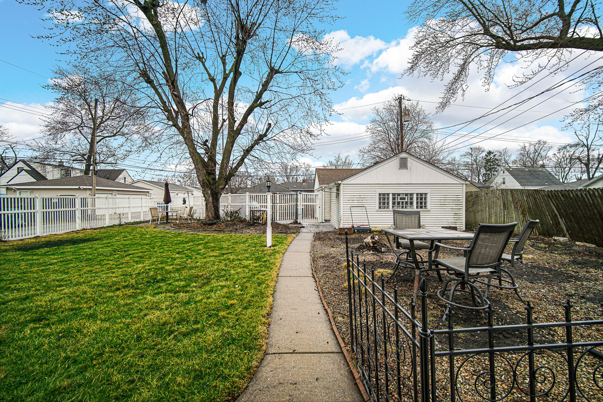 928 176th Street Hammond, IN 46324 - Photo 23 of 25 a view of a house with backyard and sitting area