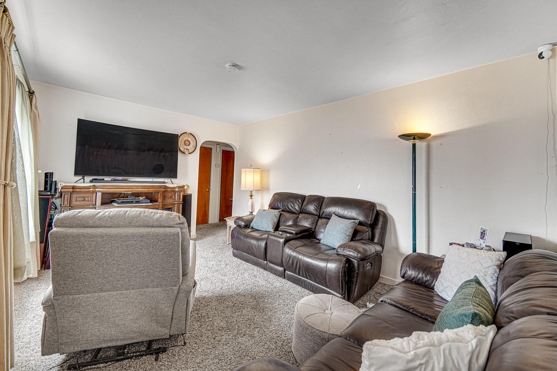 928 176th Street Hammond, IN 46324 - Photo 3 of 25 a living room with furniture and a flat screen tv