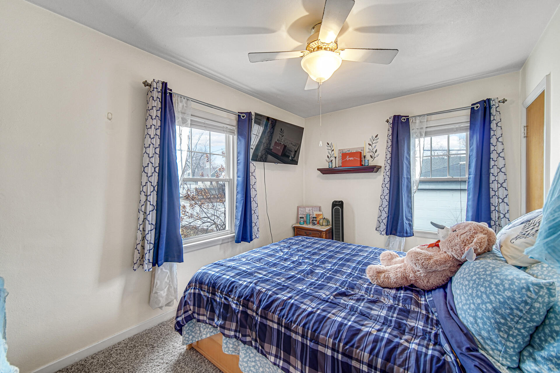 928 176th Street Hammond, IN 46324 - Photo 10 of 25 a bedroom with a large bed and a window