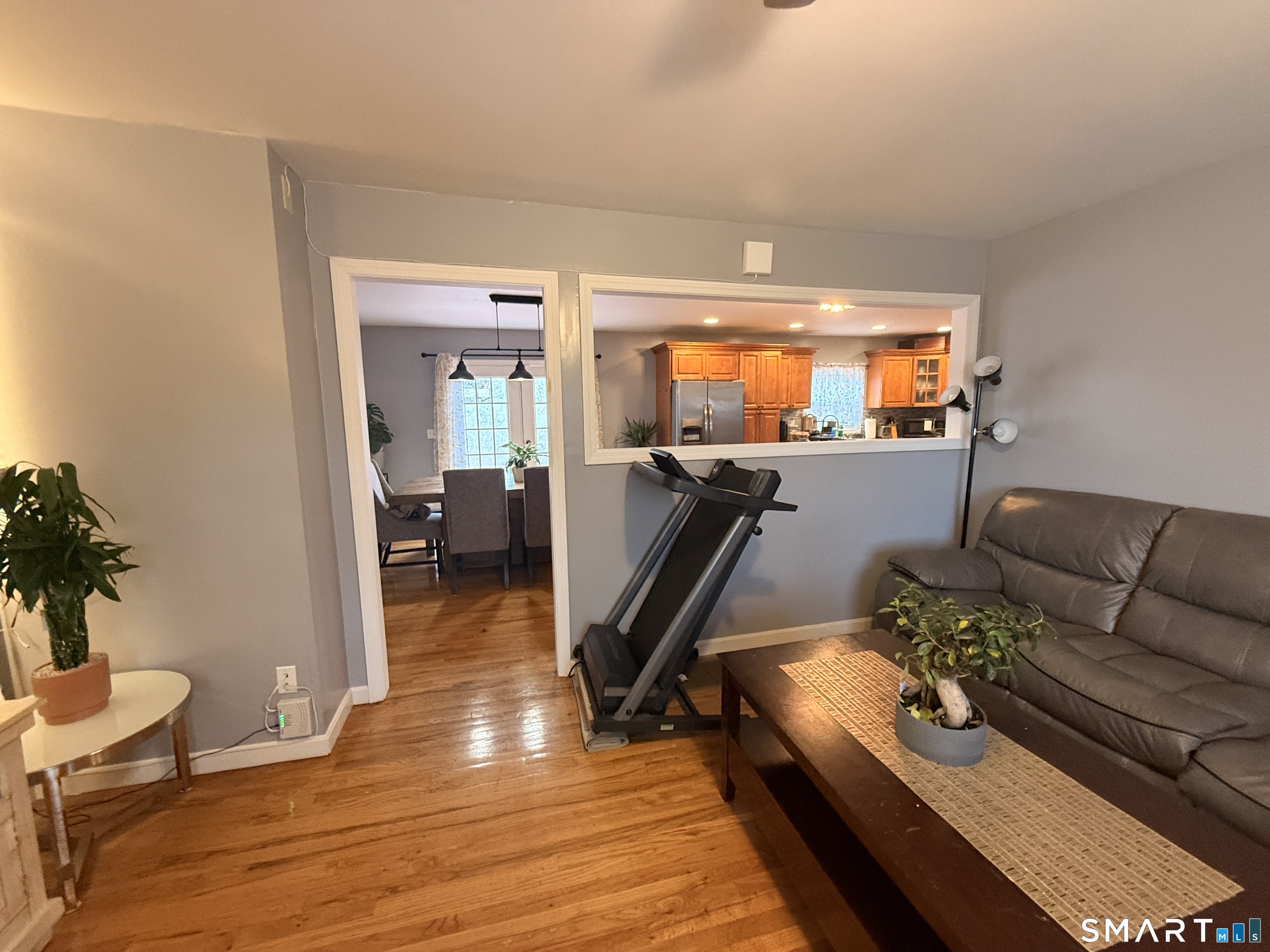 47 Oronoque Trail Shelton, CT 06484 - Photo 21 of 44 a living room with furniture and wooden floor
