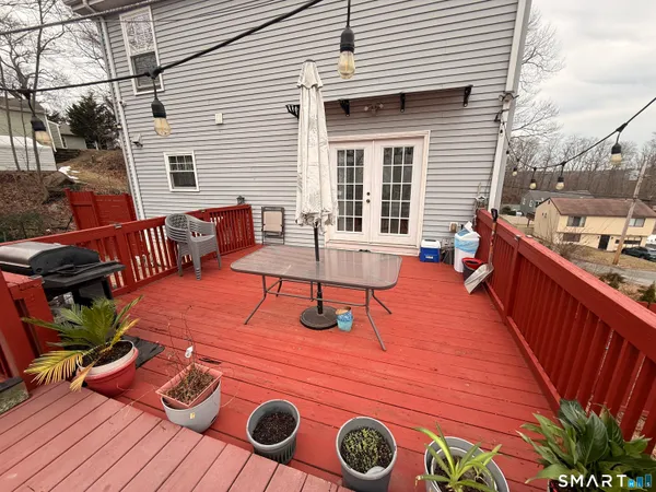 a outdoor space with patio the couches and a dining table with the chairs