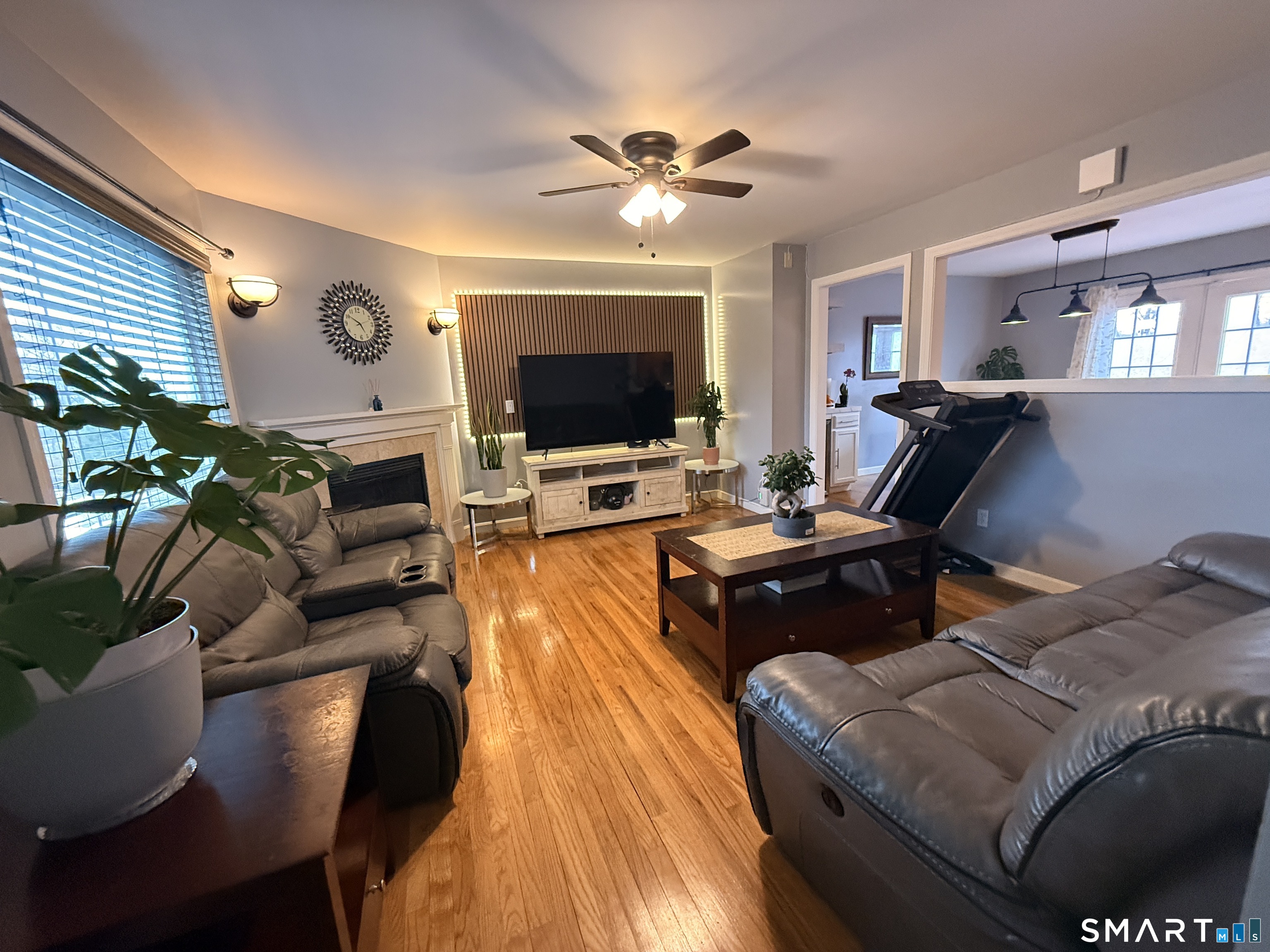 47 Oronoque Trail Shelton, CT 06484 - Photo 24 of 44 a living room with furniture and a flat screen tv