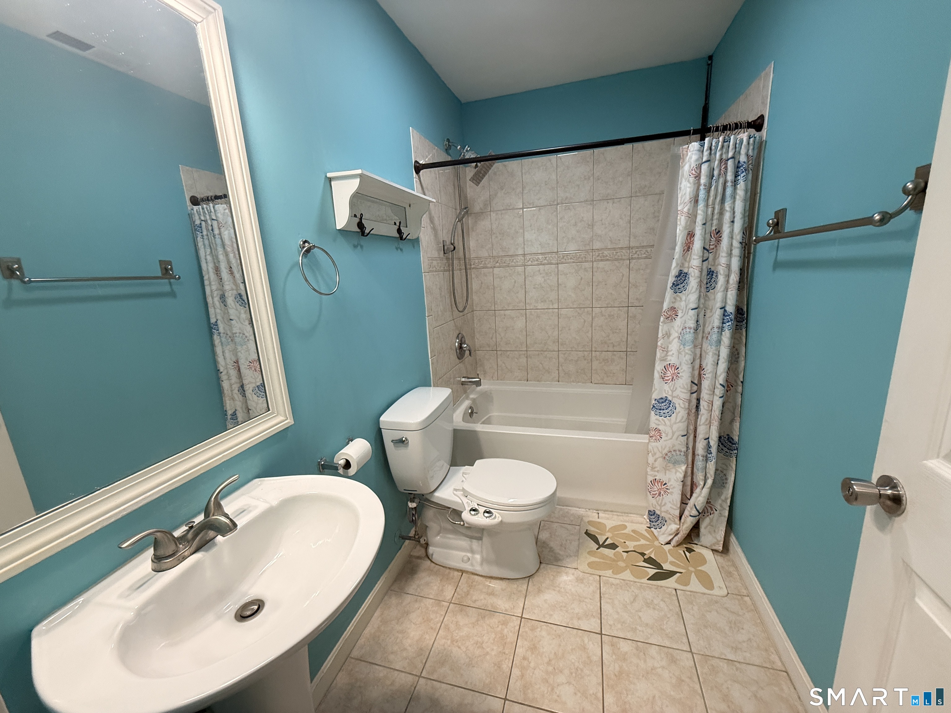 47 Oronoque Trail Shelton, CT 06484 - Photo 32 of 44 a bathroom with a sink toilet and shower