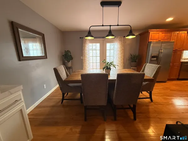 a room with a table and chairs