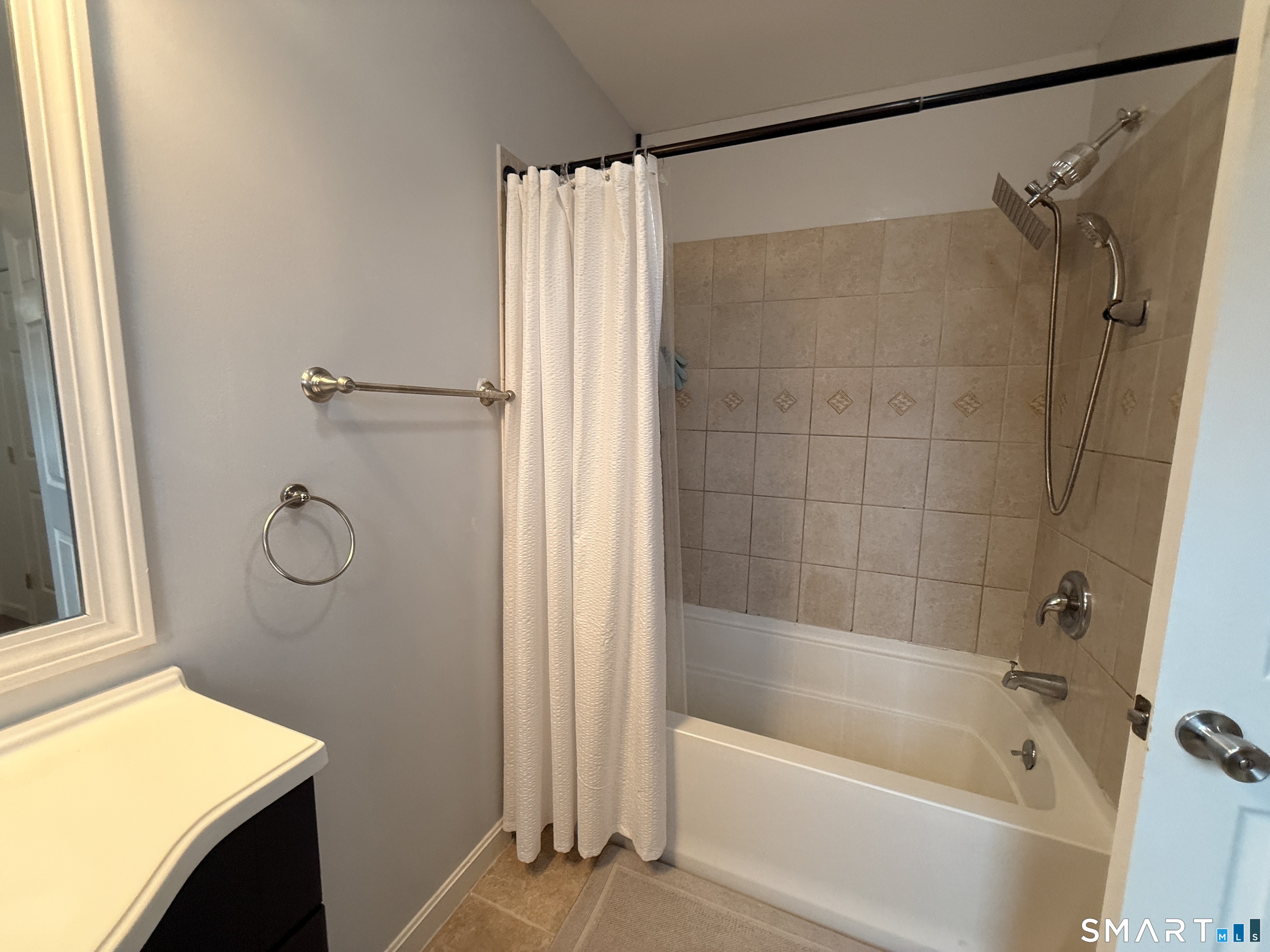 47 Oronoque Trail Shelton, CT 06484 - Photo 36 of 44 a bathroom with a shower and a bath tub