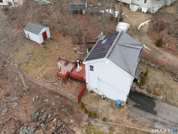a brick building with a yard