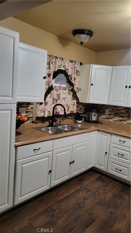 a bathroom with a toilet and a sink